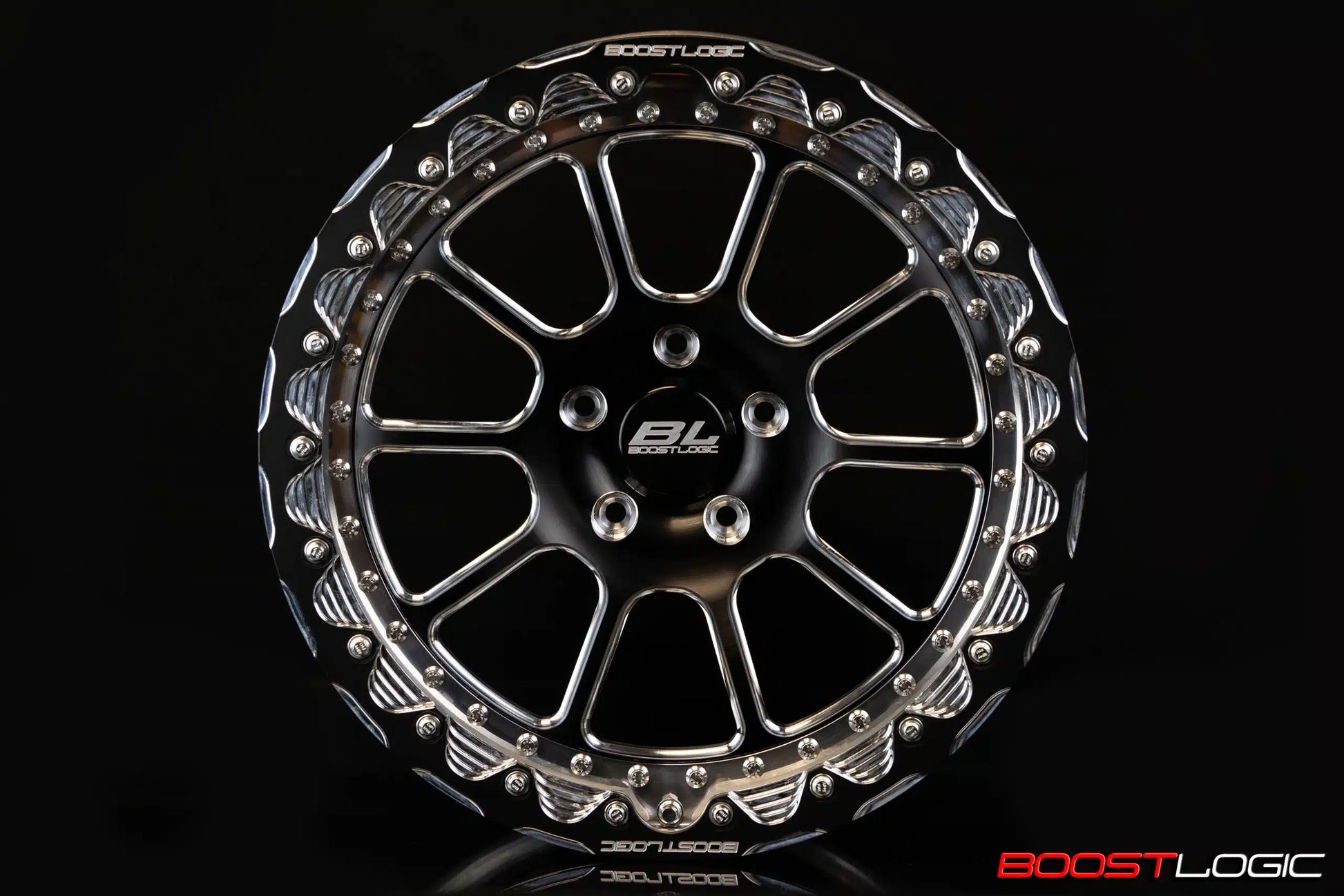 A single 18-inch Boost Logic 10 spoke drag racing wheel with a two-tone black and machined finish.