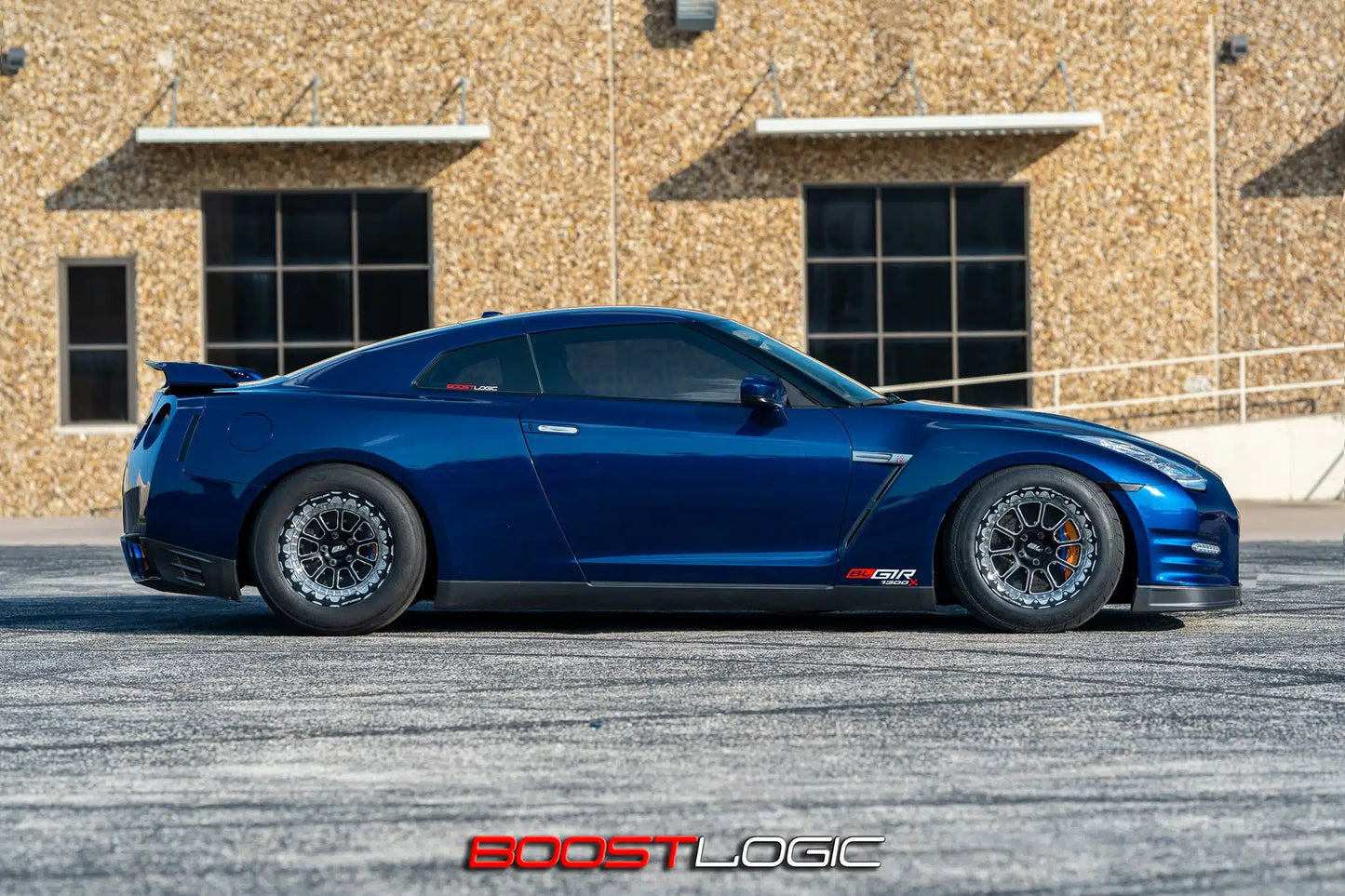 Boost Logic 10-spoke black and machined beadlock drag wheel with ARP hardware for Nissan GT-R R35