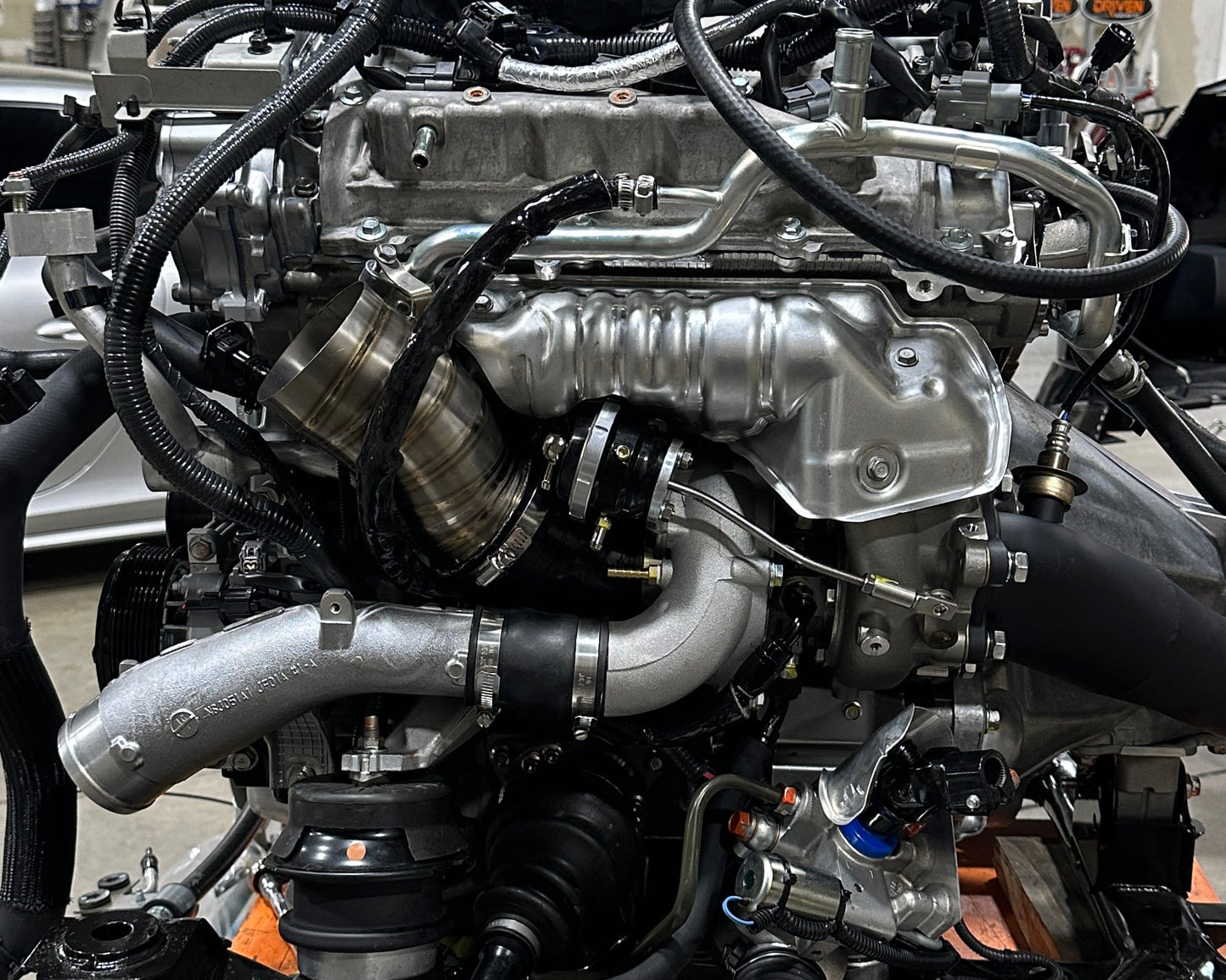 Boost Logic Ultra Spool twin Garrett G660 turbo kit with 3.5-inch titanium inlet pipes for 2009+ Nissan GT-R R35