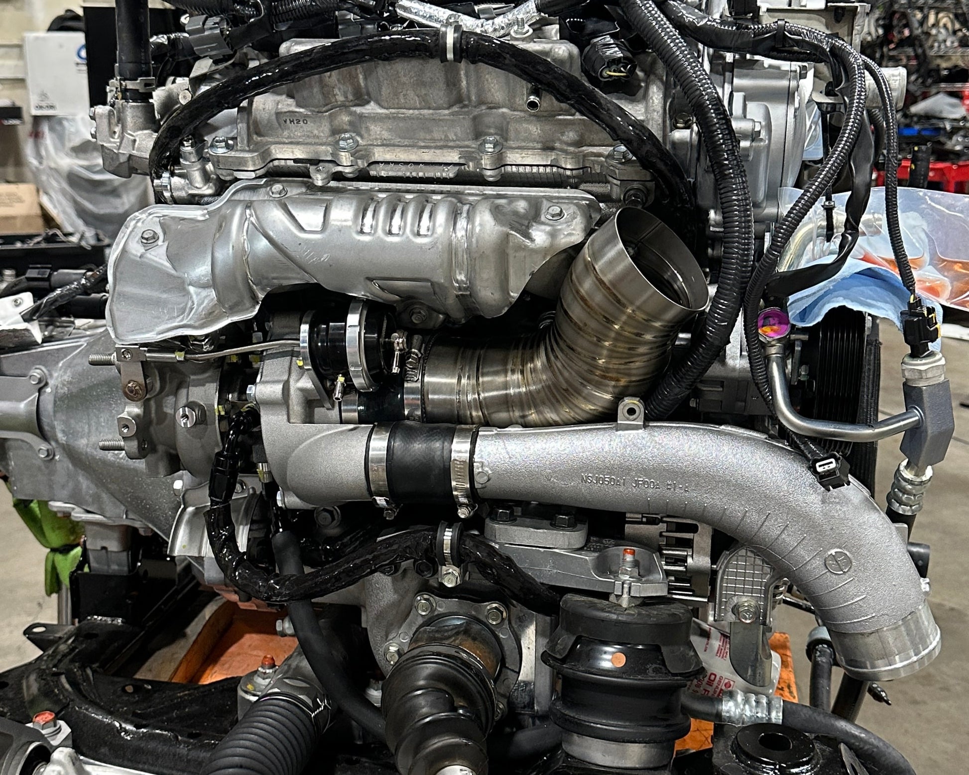 Boost Logic Ultra Spool twin Garrett G660 turbo kit with 3.5-inch titanium inlet pipes for 2009+ Nissan GT-R R35