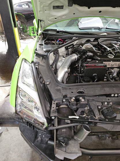 Close-up view of a GFB Deceptor Pro II BOV installed on an R35 GTR, showing the adjustable venting bias system upgrade.