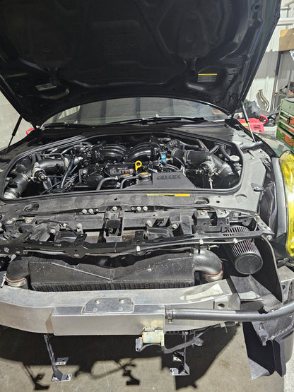 Nissan GTR R35 engine bay featuring the Go Fast Bits T9502 Deceptor Pro II blow off valve installed for improved turbo response.